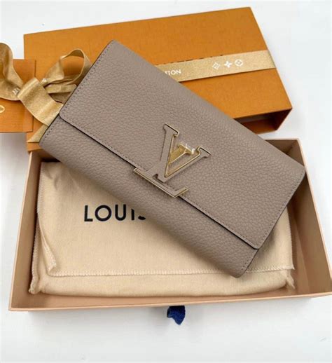 louis vuitton capucines wallet review